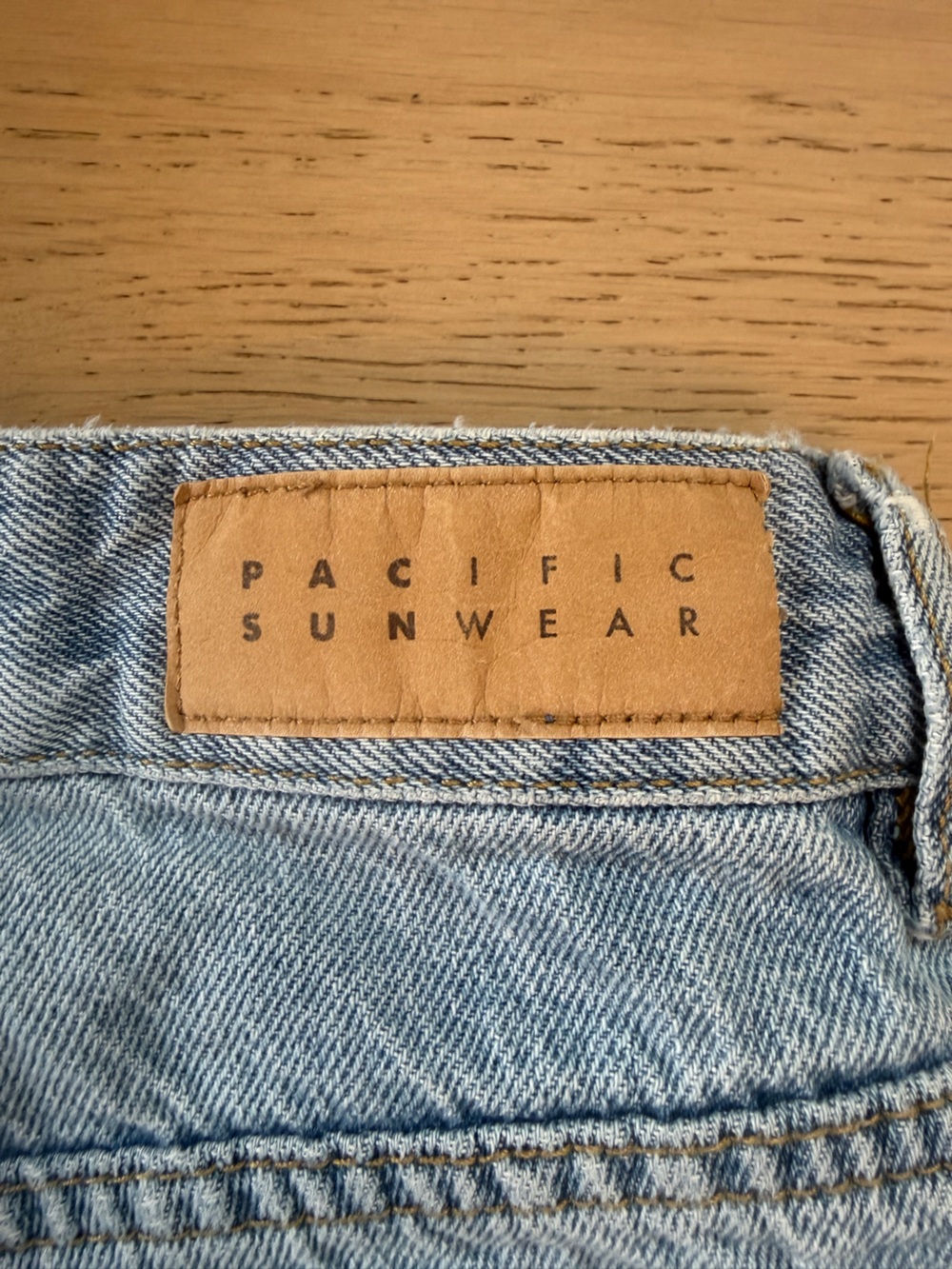 Pacific Sunwear Light Blue Denim Jeans with Tan Leather Patch